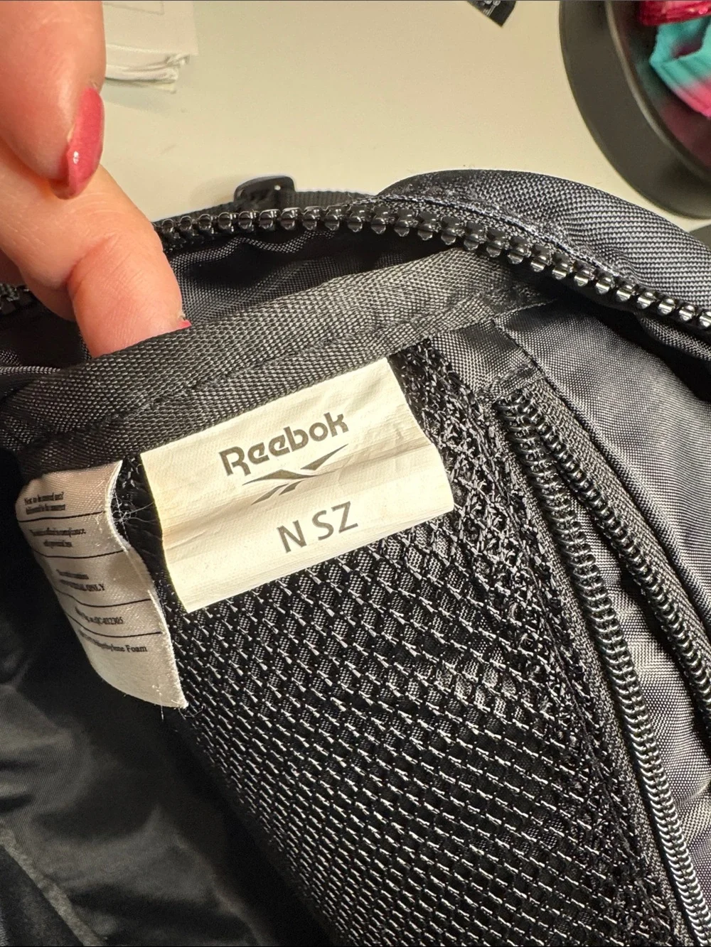 Reebok Black Mini Backpack with Subtle Logo Print. Excellent Condition